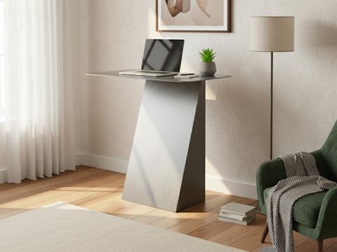 Minimalist bent metal desk with a laptop in a living room